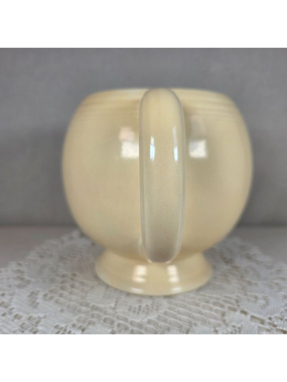 Vintage Fiesta Ivory Ice Lip Pitcher 9 1/2" Wide 7" Tall With Minor Chips On Bas - Picture 4 of 8